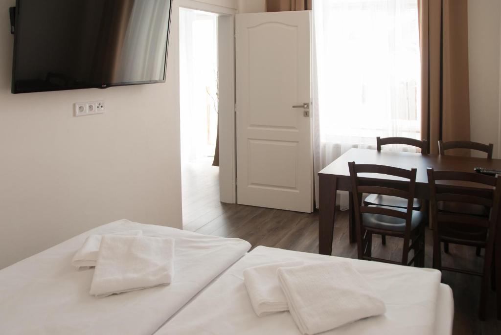 Postel nebo postele na pokoji v ubytování Residence Vysta