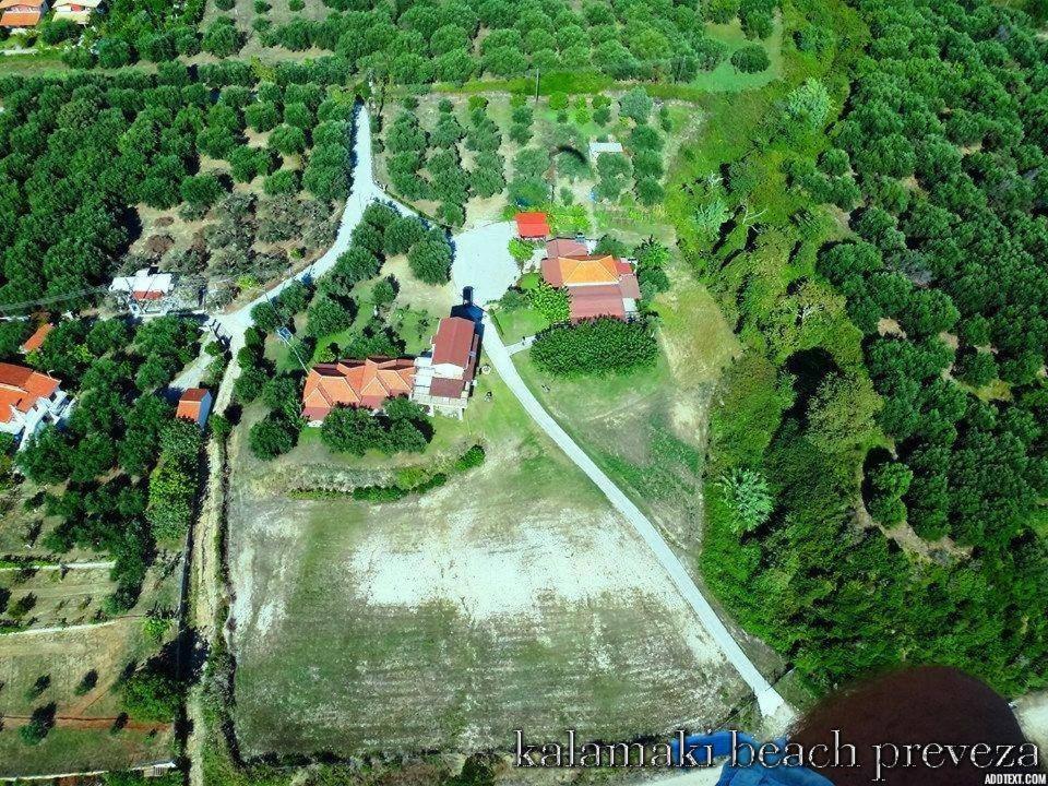 an aerial view of a house in a field at guest house kalamaki beach preveza in Rizá