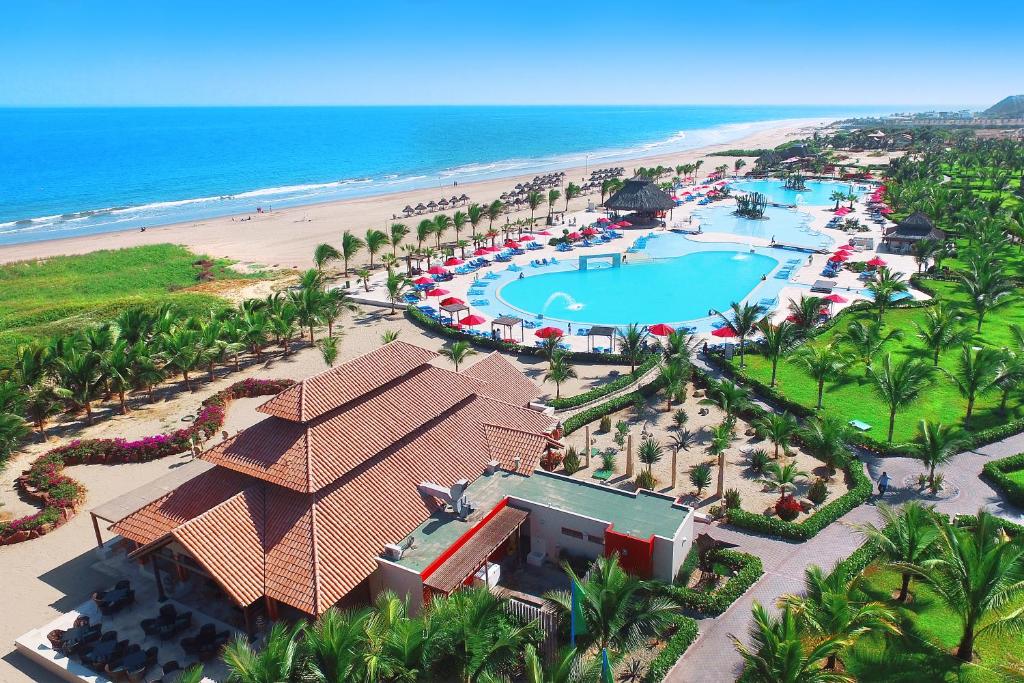 an aerial view of a resort with a pool and the beach at Royal Decameron Punta Sal - ALL INCLUSIVE in Canoas de Punta Sal
