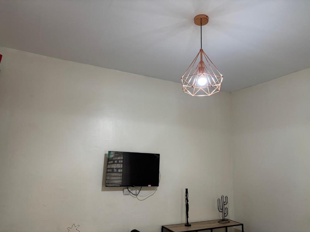 Televisor o centre d'entreteniment de Studio kribi