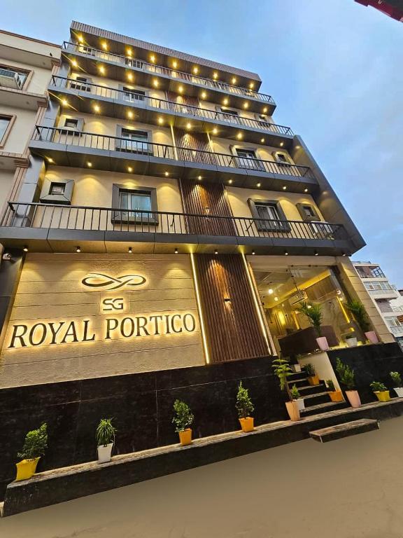 a hotel building with a royal porto sign on it at SG Royal Portico in Haridwār