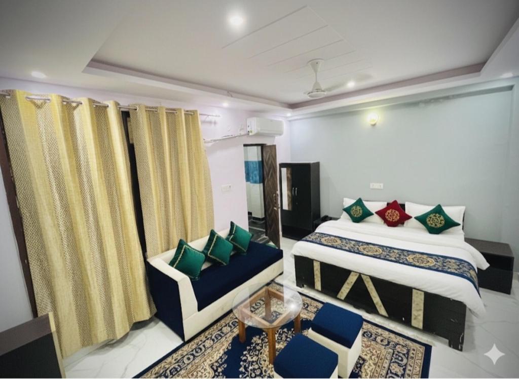 En eller flere senge i et værelse på Hotel regal garden