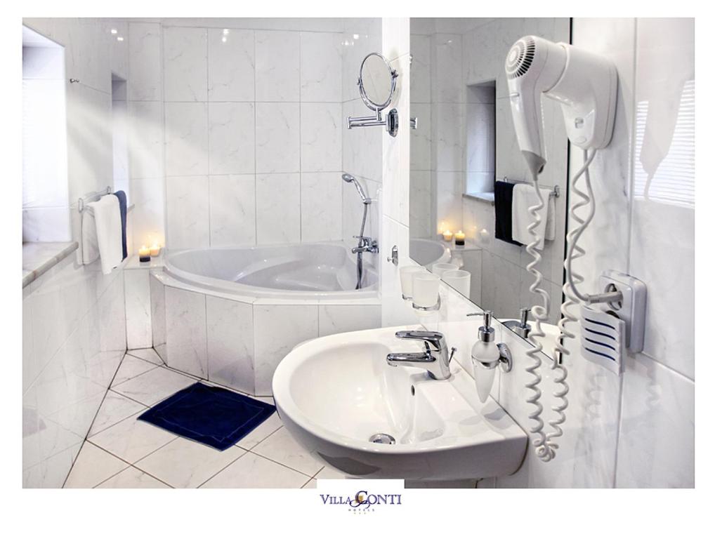 Koupelna v ubytování Hotel Villa Conti