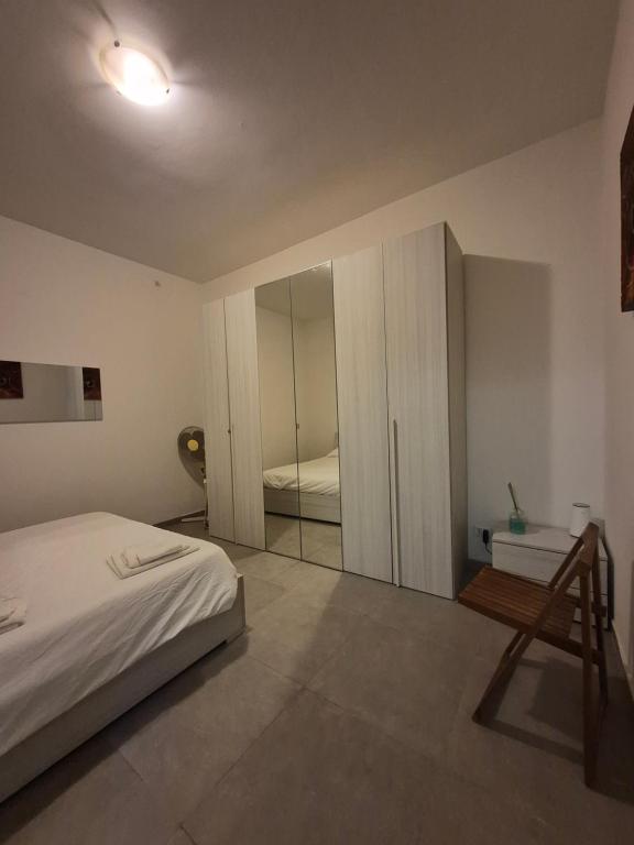 Letto o letti in una camera di La Casetta del 26 B&B