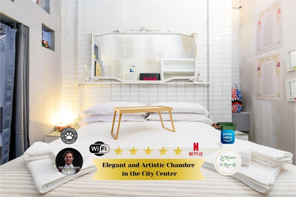 En eller flere senge i et værelse på Centro Torino - Chambre Caltagirone - by Cesare Marretti