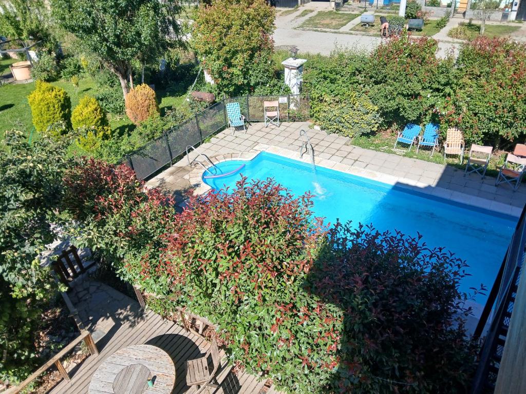 an overhead view of a swimming pool in a yard at Altos de el bolson in El Bolsón