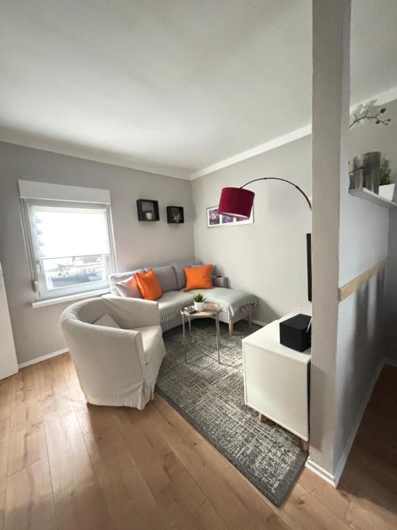 a living room with a couch and a table at "Haus Bella" in Cochem