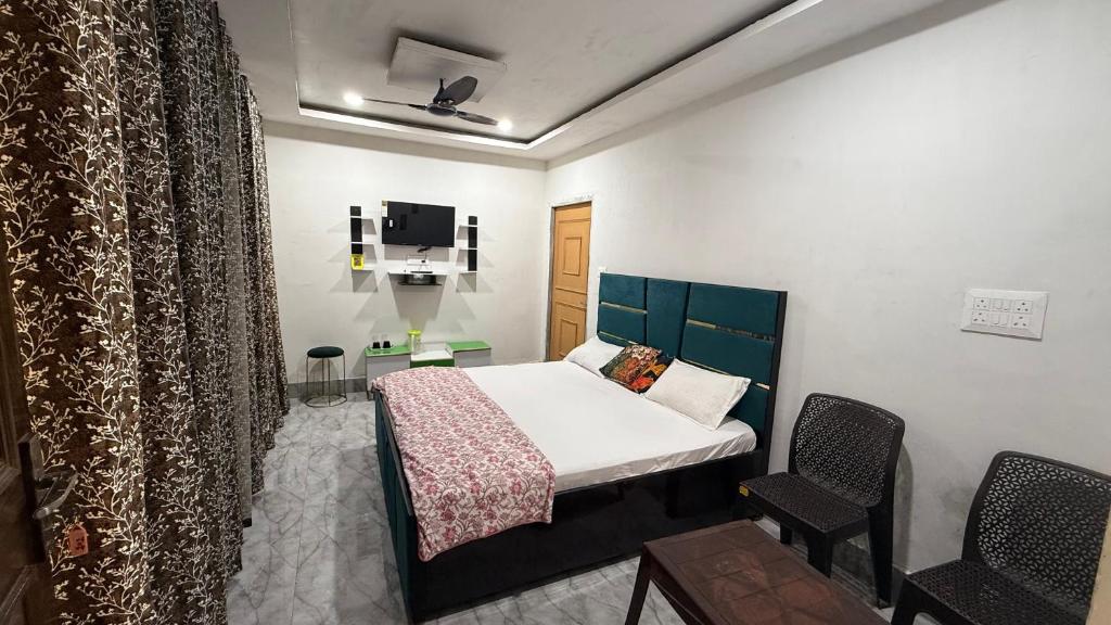 Postel nebo postele na pokoji v ubytování Sneham home stay