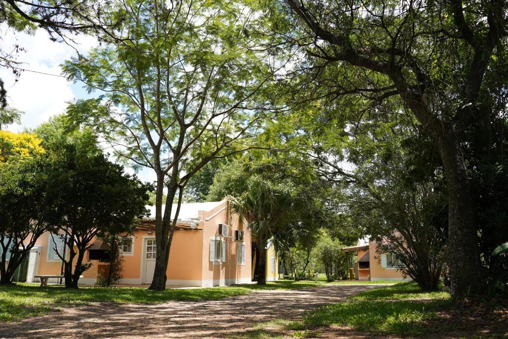 an empty street in front of a house at Cabañas de Itacú in Chajarí