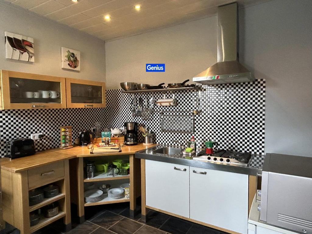 Kuchyň nebo kuchyňský kout v ubytování Holiday il Macellaio - Cosy Apartment - Neustadt Zentrum