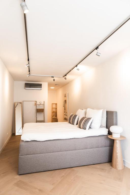 a bedroom with a large bed in a room at B&B s12 in Doetinchem