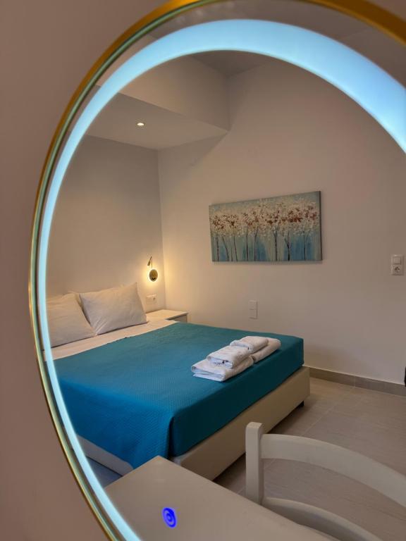 En eller flere senge i et værelse på Eva Ivoni apartments