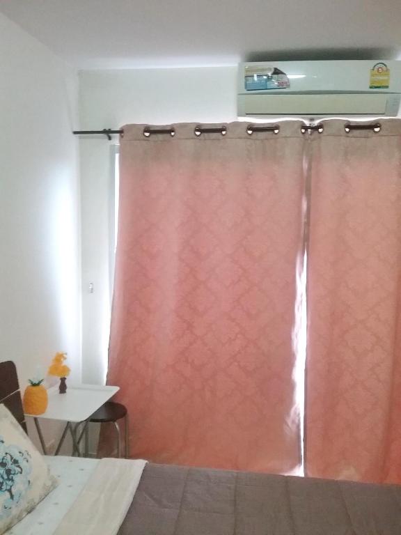 Postel nebo postele na pokoji v ubytování We Love Kata