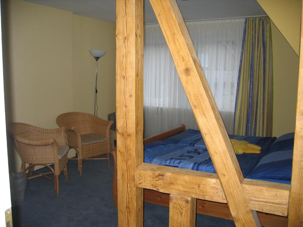 Postel nebo postele na pokoji v ubytování Pension & Ferienhaus Latröpchen