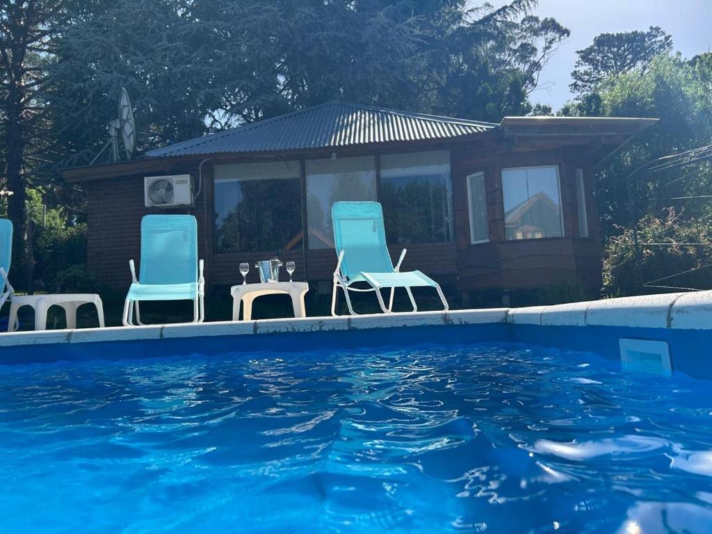 Bazén v ubytování Cabaña Soñada nebo v jeho okolí