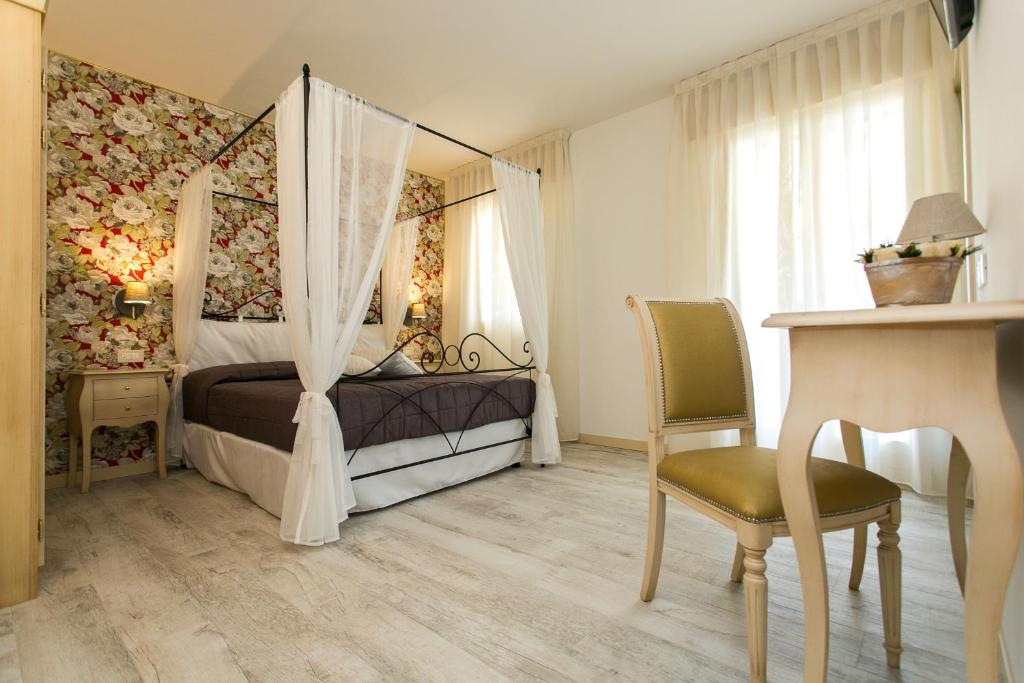 Postel nebo postele na pokoji v ubytování Guest House Dolce Laguna