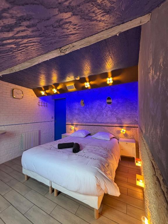 En eller flere senge i et værelse på Au cœur de pont