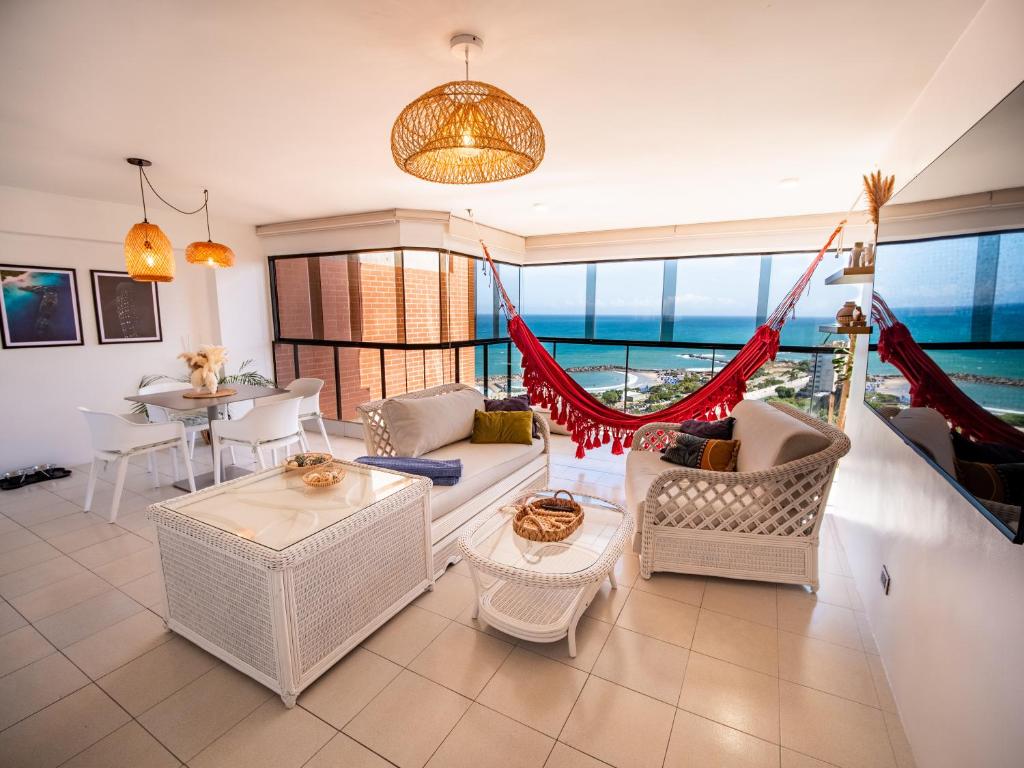 Posezení v ubytování Beach front 9 min to airport DosLocosDeViaje
