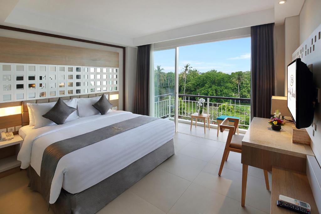 Jimbaran Bay Beach Resort and Spa by Prabhu - Trunajaya Deluxe Double O Twin.