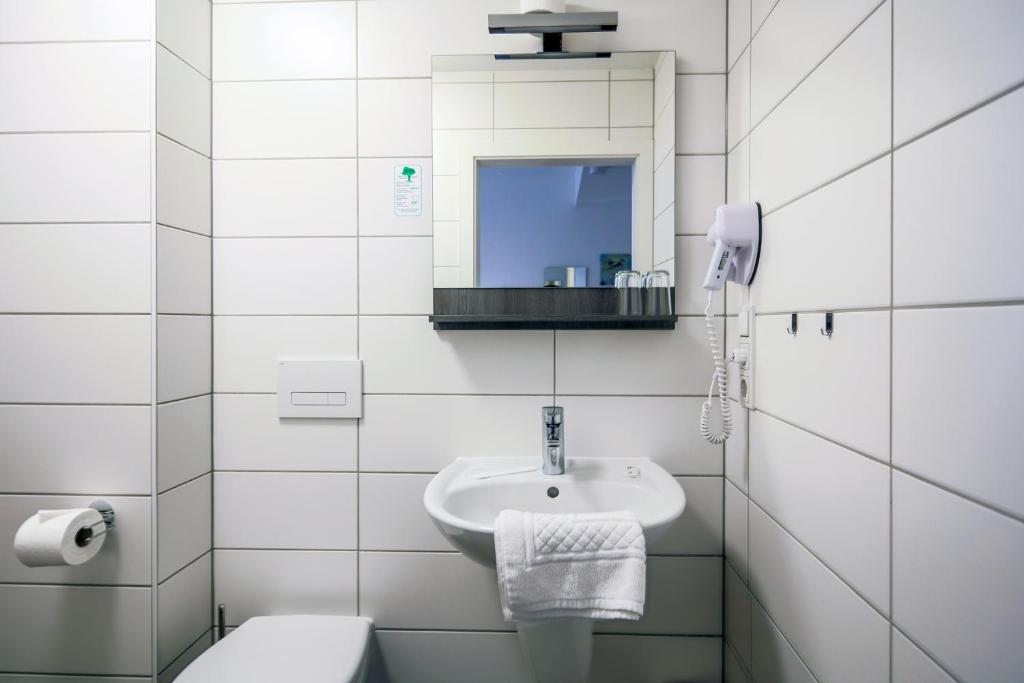 Koupelna v ubytování Hotel Kleiner Markt