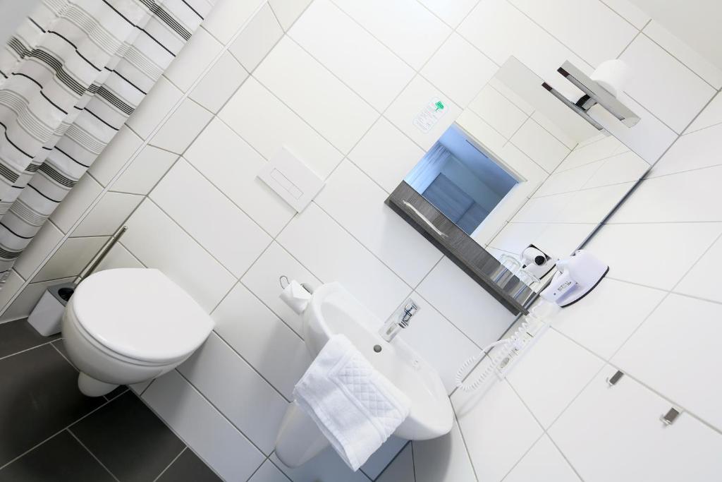 Koupelna v ubytování Hotel Kleiner Markt