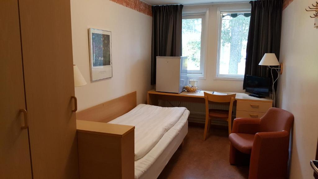 Postel nebo postele na pokoji v ubytování Hotell Sport & Rest