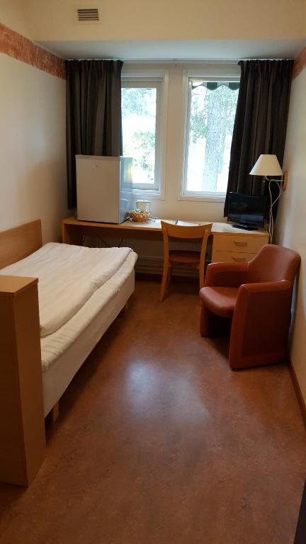 Postel nebo postele na pokoji v ubytování Hotell Sport & Rest