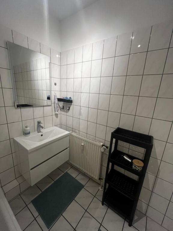 Et badeværelse på Citynahes modernes Apartment