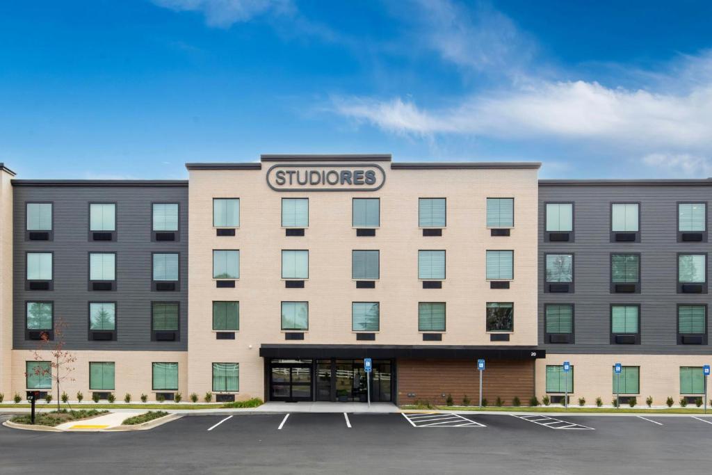 a building with a school sign on top of it at StudioRes by Marriott Newnan in Newnan