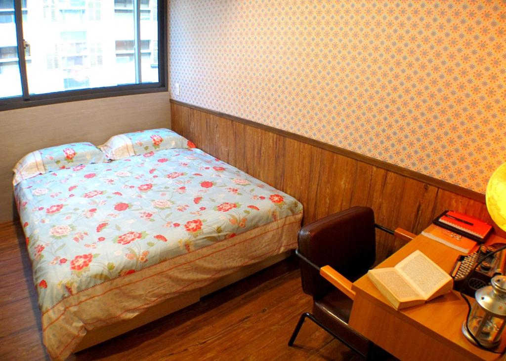 Postel nebo postele na pokoji v ubytování Formosa 101