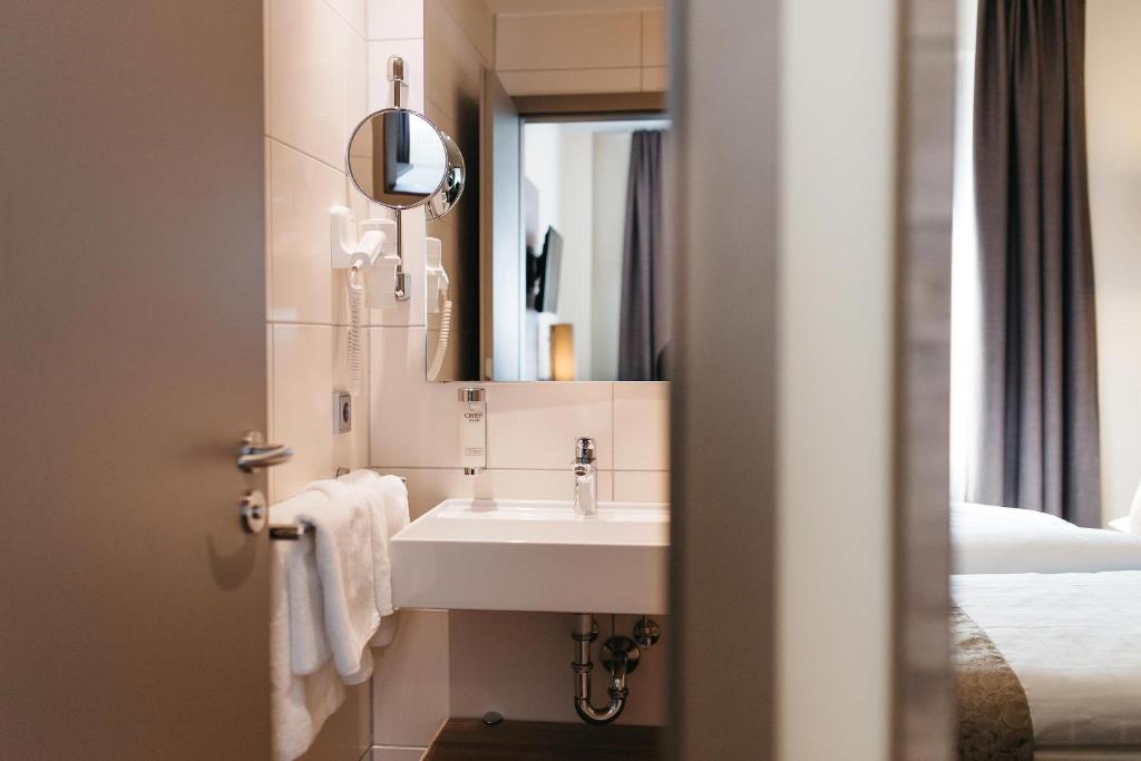 Koupelna v ubytování Hotel Sion