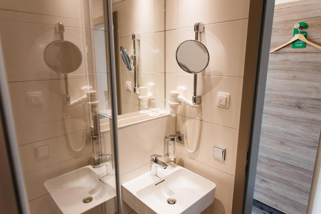 Koupelna v ubytování Hotel Sion