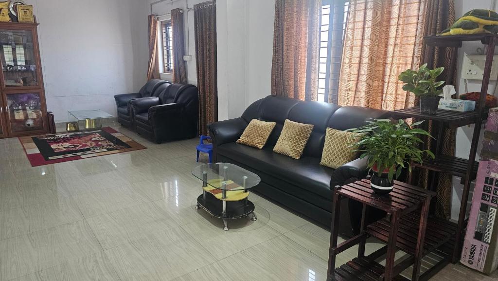 Khu vực ghế ngồi tại Amee's Luxury above the City