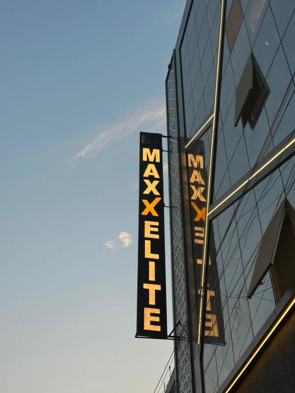 a sign on the side of a building at MAXX Elite in Gurgaon