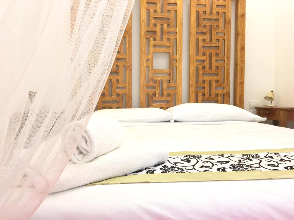 Posteľ alebo postele v izbe v ubytovaní CasaBlanca Apartment