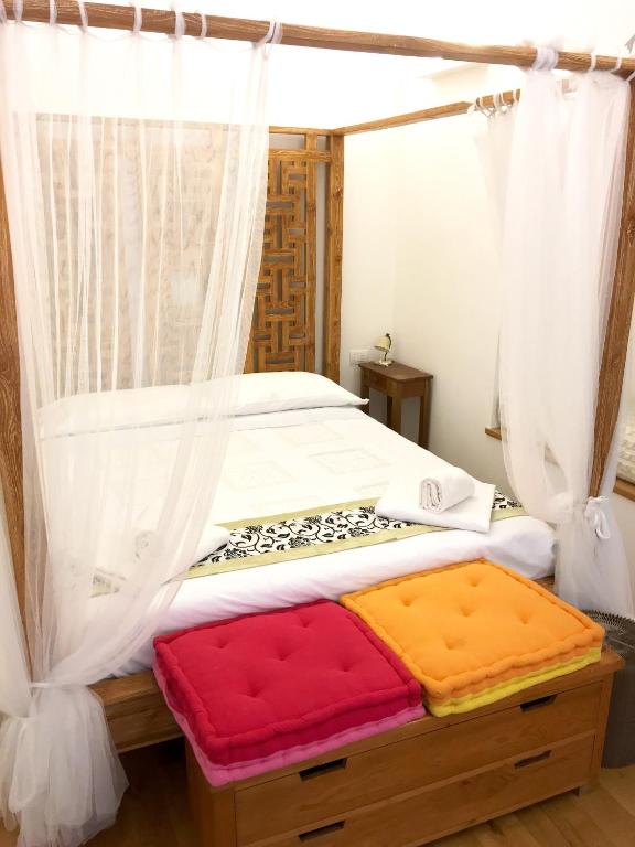 Posteľ alebo postele v izbe v ubytovaní CasaBlanca Apartment
