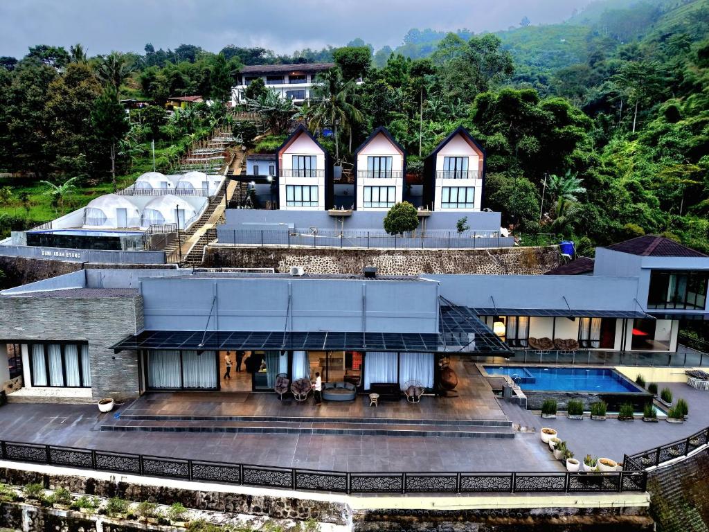 an aerial view of a resort with a swimming pool at Anemos Resort By Tamastu in Pasirpogor