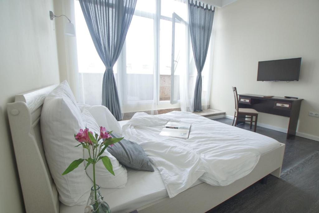 Cama o camas de una habitación en Residence Turgenev