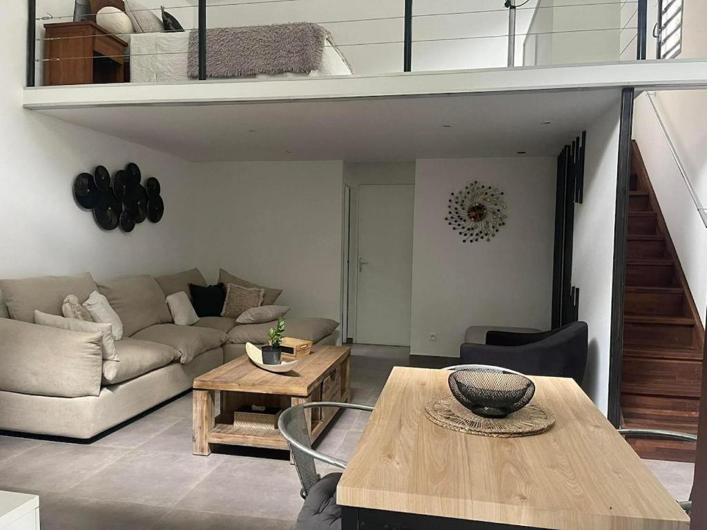 Et opholdsområde på ÔCœur du Verger Private Tropical Loft