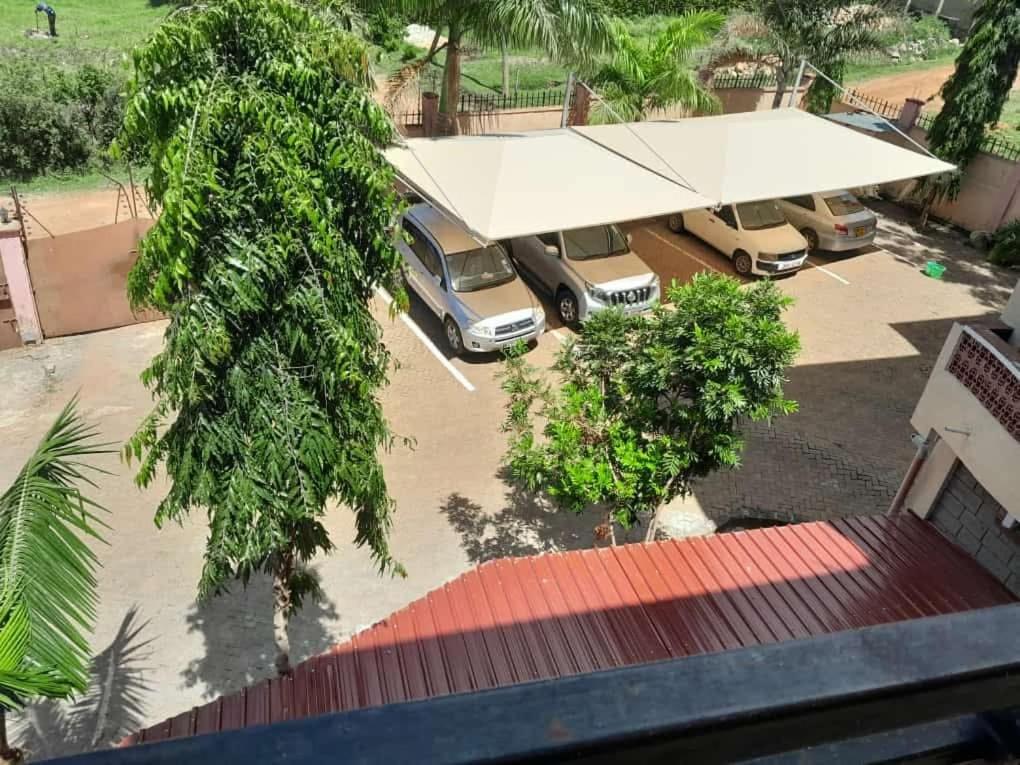 an overhead view of a parking lot with cars parked at satelite view hotel in Webuye