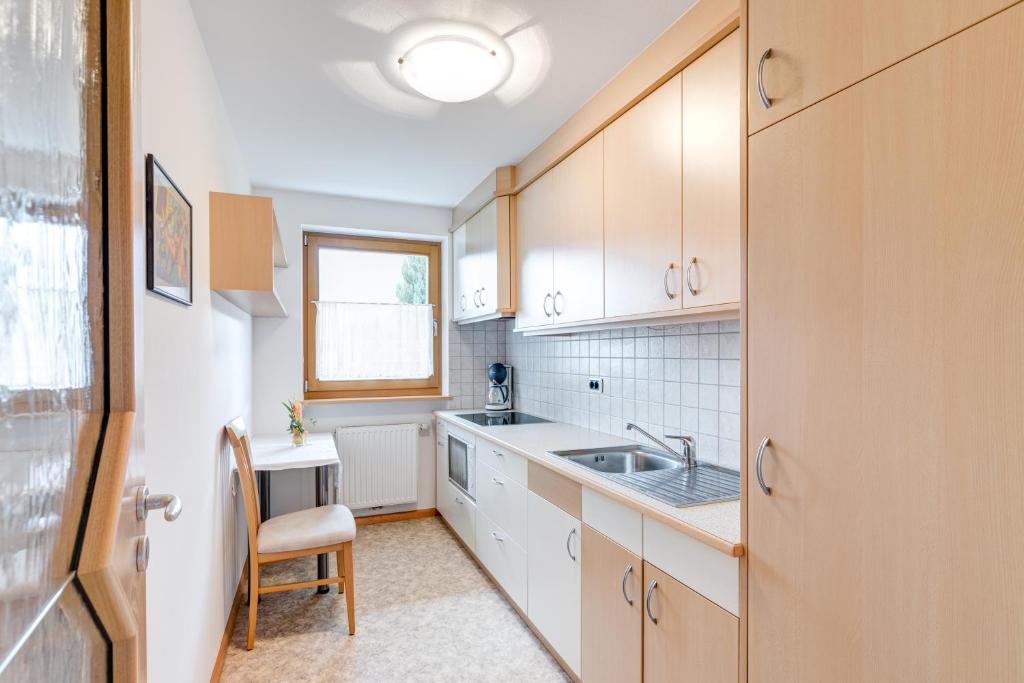 Kuchyň nebo kuchyňský kout v ubytování Pension Haus am See
