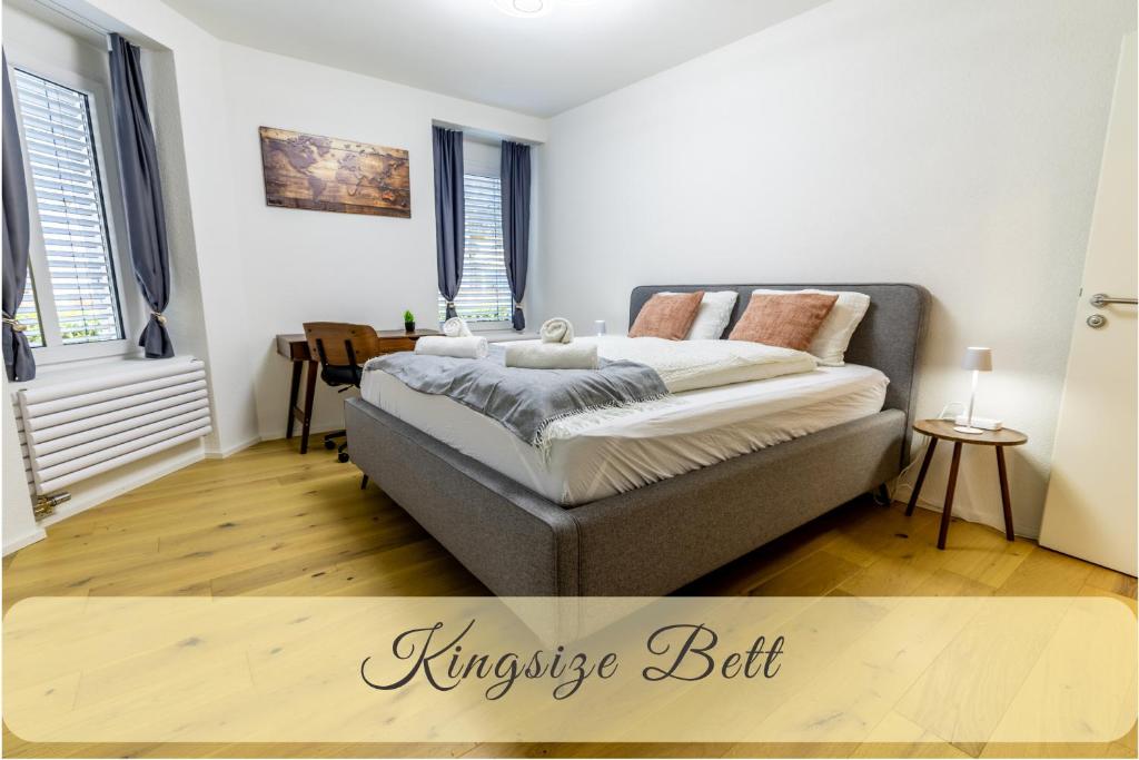 En eller flere senge i et værelse på Jasminkas Host 3 - Stadtwohnung mit Küche & gratis Parkplatz