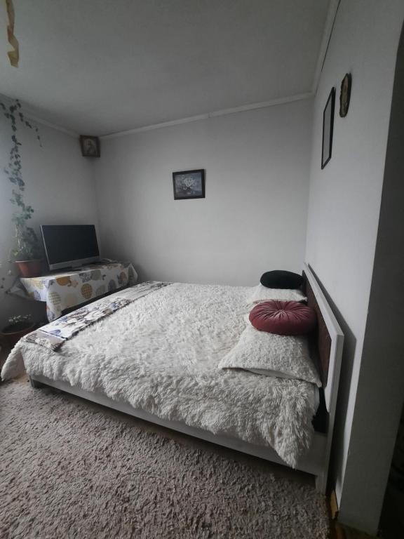 Llit o llits en una habitació de Max Apartament
