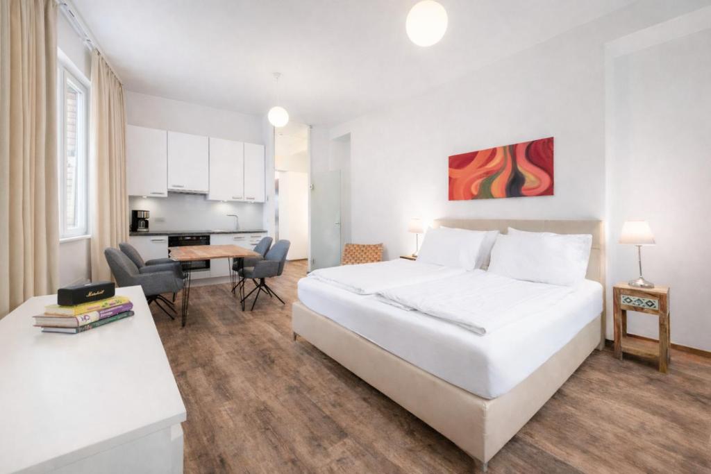 En eller flere senge i et værelse på Club Alpenresidenz Gastein