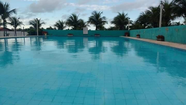Swimmingpoolen hos eller tæt på Apartamento Aluguel Morro Branco.