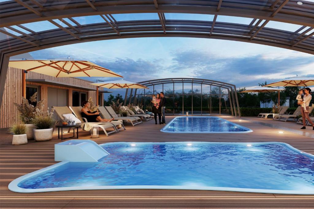 Swimmingpoolen hos eller tæt på Trimare Blue Apartament Sztutowo