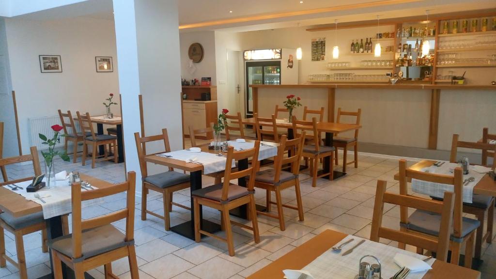 A restaurant or other place to eat at Penzion Conti