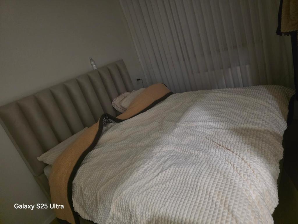 Postel nebo postele na pokoji v ubytování Roosendaal City Apartment