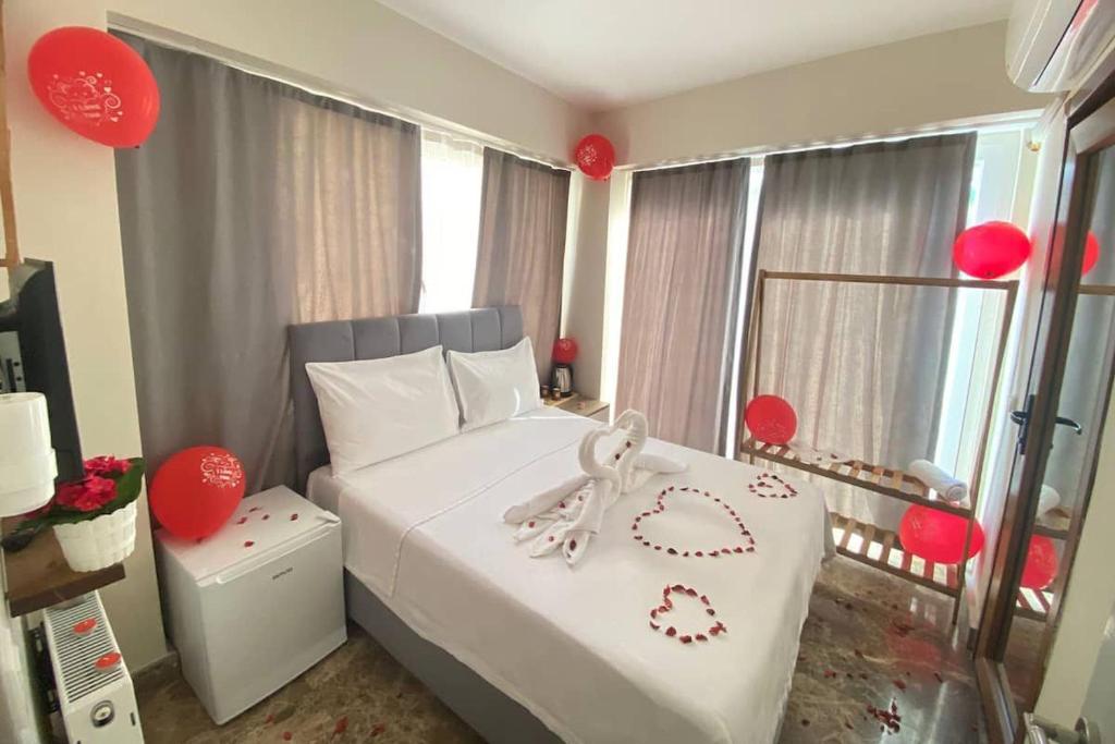 Giường trong phòng chung tại Büyükada Çarşı Pansiyon