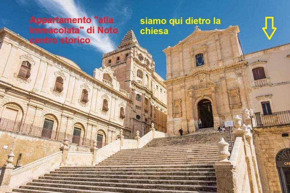 a group of stairs in front of a building at Appartamento alla Immacolata Noto Centro Storico in Noto